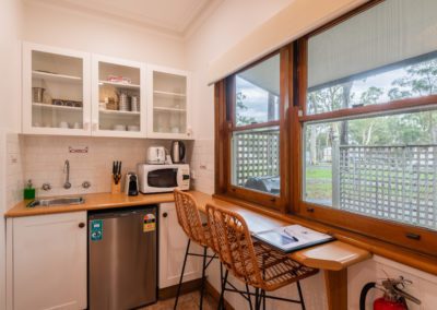 Bay and Bush Cottages: Complementary Kitchen and outside view